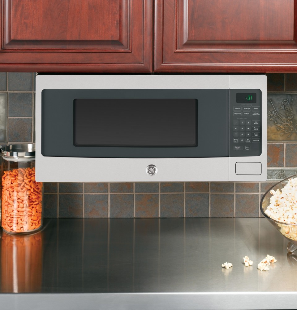 GE PEM31SFSS 1.1 cu. ft. Countertop Microwave Oven with 800 Watts, 10